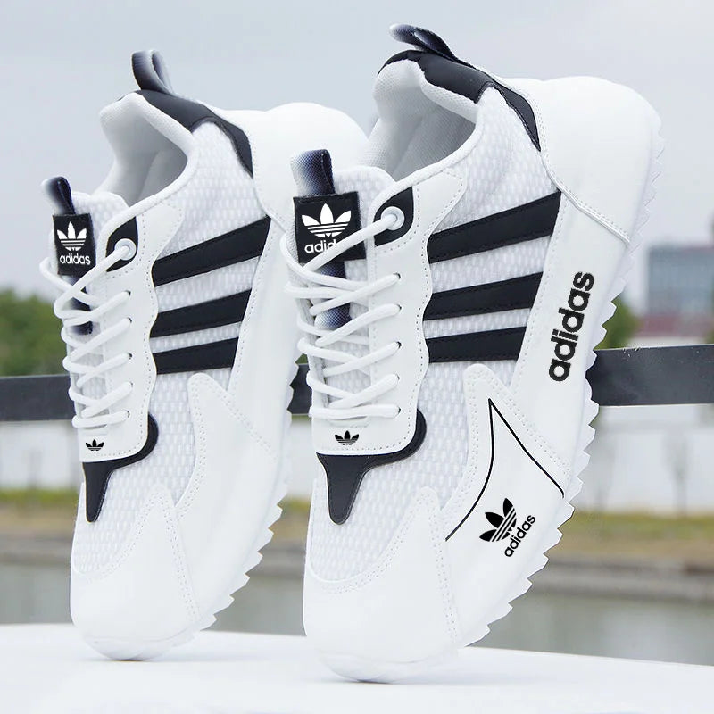 Priedušné športové bežecké topánky Adidas